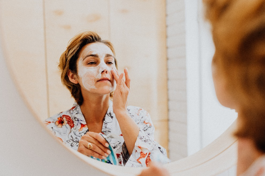 Woman applying a lotion